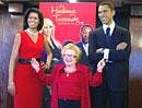 Dr Ruth Westheimer stands in front of wax figures of US President Barack Obama and Michelle at Madame Tussauds in Washington on Thursday. AFP
