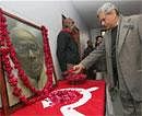 CPI-M leader Sitaram Yechury pays floral tribute to former West Bengal chief minister Jyoti Basu at the party office in New Delhi on Sunday. PTI