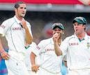 Wayne Parnell (left) celebrates with team-mates Ashwell Prince and AB de Villiers the dismissal of Englands Kevin Pietersen at Johannesburg on Sunday. AP