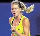 Maria Kirilenko celebrates her victory over Maria Sharapova on Monday. Reuters