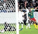 Cameroon skipper Samuel Eto'o (right) scores against Zambia during their African Nations Cup match on Sunday. AFP