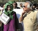 Minister of State for Environment and Forests Jairam Ramesh asks activists protesting against Bt Brinjal to maintain silence during a consultation over the issue in Ahmedabad on Tuesday. PTI