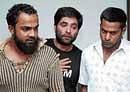 Mystery men: (From left) Alleged abductors Siraj, Naheed Sharief and Jabir arrested in connection with a kidnap case in Bangalore on Tuesday. dh photo