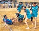 Keralas Anil Kumar (left) is caught by Jammu and Kashmirs Harbans Singh  in the 9th all-India BSNL kabaddi tournament in Bangalore on Wednesday. DH photo