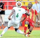 Burkina Fasos Hamadou Tall and Ghanas Haminu Dramani (right) battle for possession in the  African Nations Cup on Wednesday. AFP