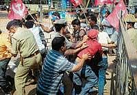 road to justice Police arresting CPM activists who were picketing the Deputy Commissioners office in Mangalore on Thursday demanding 35 kg rice to poor families every month at Rs 2 per kg. DH photo