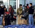 on guard: A CISF official stands guard at the Indira Gandhi International Airport in New Delhi on Saturday. Security was further strengthened in airports across India and sky marshals ordered on flights after intelligence reports that terror groups might target an Air India flight operating from a South Asian country. AFP