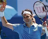 Champion: World number one Roger Federer celebrates  after his win over Spains Albert Montanes. AFP