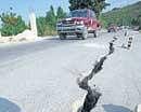 Deep fissures: The road to Leogane from Port-au-Prince shows damages in several places following the earthquake. NYT image