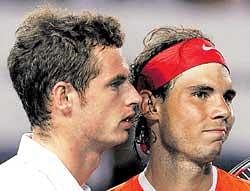 Painful exit: Spains Rafael Nadal (right) with Britains Andy Murray after retiring hurt     during his Australian Open quarterfinal match on Tuesday. Reuters