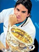 Eyeing more: Roger Federer with the Trophy. AFP