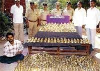 Booty: Jalahalli police with bells worth Rs 2 lakh in Bangalore on Wednesday.