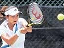 In complete control: Indias Sania Mirza returns during her Fed Cup win over Singapores Li Yun Tan on Thursday. AP