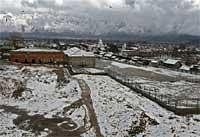 An aerial view of snow-bound Srinagar on Tuesday. Upper reaches of Kashmir valley is witnessing heavy snowfall these days. PTI