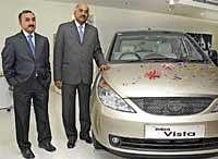 Tata Motors Senio Vice-President (Commercial PBU) S Krishnan posing at the new dealership. DH Photo