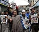 Jammu and Kashmir Liberation Front (JKLF) activists shout pro-freedom slogans during a protest in Srinagar on Thursday. AFP