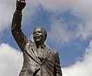 A statue of former South African President Nelson Mandela stands outside the Groot Drakenstein prison near the town of Franschhoek, South Africa on Wednesday. AP