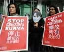 The coalition for a free Burma protest outside the Cheung Kong Centre in Hong Kong on February 5, 2010. AFP