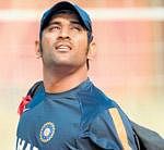 Will the heavens answer our call?: Indian skipper Mahendra Singh Dhoni arrives for training at Eden Gardens on Saturday. AFP