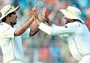 GIMME TEN: Zaheer Khan and Harbhajan Singh celebrate the dismissal of a South African batsman during the first day of the second Test Match at Eden Gardens in Kolkata on Sunday. PTI