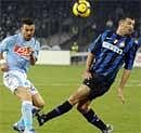 Inter Milan's Walter Samuel, of Argentina, right, vies for the ball with Napoli's Fabio Quagliarella, during the Serie A soccer match between Napoli and Inter Milan, at Naples' San Paolo stadium, southern Italy on Sunday. AP