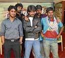 New Talent: Actor Yash with the cast of Rajadhani.