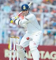 Focused:  Virender Sehwag en route to his blistering century against South Africa in Kolkata on Monday. PTI