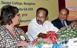 Union Law Minister M Veerappa Moily (centre) sharing a word with CAMHADD Technical Officer Dr Roberta Ritson at a global consultative meeting on 'The Right to Health' in Bangalore on Monday. Rajiv Gandhi University of Health Sciences Vice Chancellor Dr S Ramananda Shetty is also seen. dh Photo