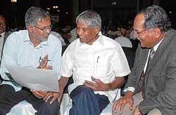 (From left) Ministers S Sureshkumar and Ramachandra Gowda and RGUHS & patron Vice Chancellor Dr S Ramananda Shetty at the valedictory function of global consultative meeting on The Right to Health in Bangalore on Wednesday. dh Photo