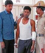 K G F Ramesh shot at by Adugodi Police Inspector Sharana Gowda on Wednesday. dh Photo