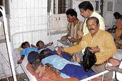 Students undergoing treatment at Primary Health Centre in Kannampalli of Bagepalli taluk.dh photo