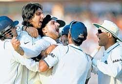 JOB WELL DONE: Harbhajan Singh celebrates with teammates after taking the last South African wicket on the last day of the 2nd Test Match at Eden Gardens in Kolkata on Thursday. PTI
