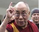 The Dalai Lama speaks to reporters outside the West Wing of the White House, after meeting with US President Barack Obama,  in Washington on Thursday. AP