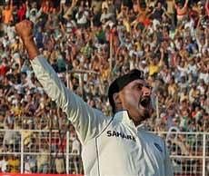 Harbhajan Singh celebrates after taking the last South African wicket of Morkel on the last day of 2nd Test Match at Eden Gardens in Kolkata on Thursday. India win the match leveling the series 1-1. PTI