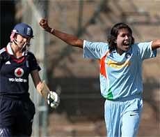 Indian captain Jhulan Goswami celebrates the wicket of England's Jennygunn during the 1st ODI match at Chinnaswamy Stadium in Bangalore on Friday. PTI