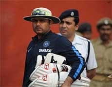 Indian cricketer Virender Sehwag heads for a practice session ahead of the second Test match between India and South Africa at Eden Garden stadium in Kolkata on February 12, 2010. AFP