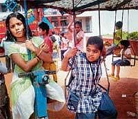 Its our day: Children enjoying various games at the special mela for the disabled in Mangalore on Sunday. DH Photo