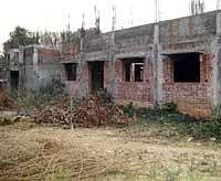 An incomplete Central library in a state of disuse in II Block of HRBR Layout. dh photo