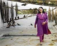 Amid The Ravens: Former Union minister Maneka Gandhi in the Black Kite cage at the People for Animals centre in Bangalore on Monday. DH Photo