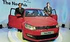 Posh & pretty Volkswagen Group Director Sales India Neeraj Garg (left) & General Manager Marketing Lutz Kothe at the launch of Polo in Mumbai on Tuesday. afp