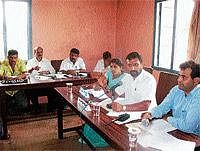 CMC President P D Ponnappa speaking at the CMC meeting in Madikeri. DH Photo