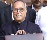 Finance Minister Pranab Mukherjee before leaving to Parliament to present the Annual Budget 2010-2011, in New Delhi on Friday. PTI