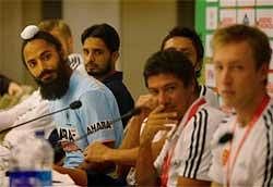 Indian Hockey captain Rajpal Singh (extreme left) and other captains during a press conference ahead of the Hockey World Cup 2010 in New Delhi. To his right is Pakistan captain Zeeshan Ashraf. PTI