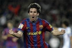 Barcelona's Argentinian forward Lionel Messi celebrates after scoring against Malaga during a Spanish League football match at the Camp Nou Stadium in Barcelona , on  Saturday. AFP