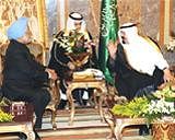 King Abdullah of Saudi Arabia, (right) speaks with Indian Prime Minister Manmohan Singh in Riyadh, Saudi Arabia, Sunday. AP
