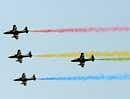 Aircraft of The Indian Naval Aerobatic Team 'Surya Kiran' fly in formation during the India Aviation 2010 show at Begumpet Airport in Hyderabad on Wednesday ,March 3, 2010. AFP