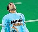 Indias Tushar Khandker reacts after narrowly missing a  goal against Spain during a World Cup match in New Delhi on Thursday. AP