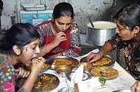 loyal People enjoying the food served. dh photos by vasu m n