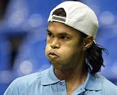 India's Somdev Devvarman reacts during Davis Cup World group first round tennis match against Russia's Igor Kunitsyn in Moscow. AP