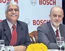 Bosch Limited Managing Director V K Vishwanathan (left) with Joint  Managing Director Manfred Duernholz briefing reporters in Bangalore on Friday.  DH Photo